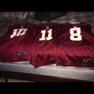 Three redskins jerseys